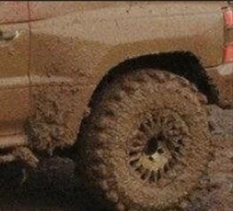 Driving in the rain with muddy body