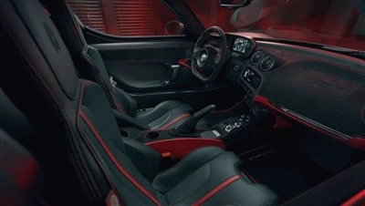 Il-Pogea Racing Timmodifika l-Alfa Romeo 4C Biex Tibdilha F'kruha Stealthy
